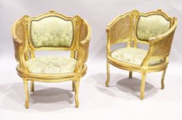 A GOOD PAIR OF FRENCH GILDED BERGERE ARMCHAIRS WITH PADDED BACKS AND SEATS.