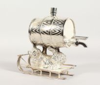 A PLATED BRANDY KEG ON A BEAR with sleigh