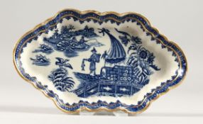A CAUGHLEY BLUE AND WHITE SHAPED OVAL WILLOW PATTERN SPOON TRAY. Crescent mark in blue. 6ins long.