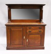 A VICTORIAN MAHOGANY SIDEBOARD, the top with long mirrored panel, three drawers and panel drawer
