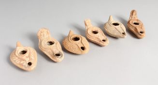 SIX ROMAN POTTERY LAMPS