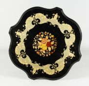 A FLORAL INLAID SHAPED TOP TRIPOD TABLE (ITALIAN) on curving legs, 2 ft. high.