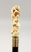 A CARVED BONE THREE RATS HANDLE WALKING STICK