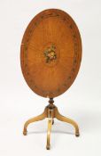 A SHERATON REVIVAL PAINTED SATINWOOD OVAL TILT TOP TRIPOD TABLE. 2 ft 3 ins wide x 2 ft 4 ins high.