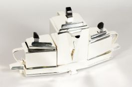 A CHRISTOPHER DRESSER STYLE PLATED TEA SET ON A STAND