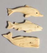 THREE CARVED BONE AQUATIC ANIMALS 3 ins long.