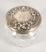 A LARGE STERLING SILVER TOP CANDY JAR, initials L.H. 5.5 ins high.