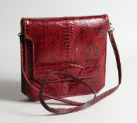 A SNAKE LEATHER DESIGNER BAG 8 ins long
