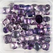 A BOX OF KUNZITE STONES