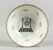 A RARE MASONIC CIRCULAR BOWL 7ins diameter. The centre with masonic emblem, gold mark to the base.