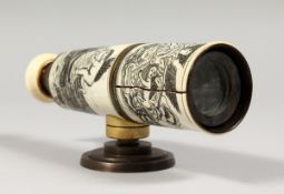 AN IVORY ETCHED TELESCOPE with boats and cupids