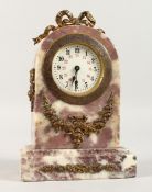 A SMALL VEINED MARBLE CLOCK with ormolu mount. 6.5ins high.
