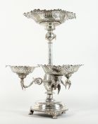 A VICTORIAN PLATE CENTREPIECE with large basket and three curving arms with pierced dishes supported