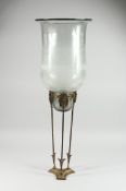 A GLASS VASE ON ORMOLU STAND , 32
