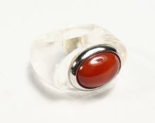 A GOOD CRYSTAL AND CORAL DRESSING RING