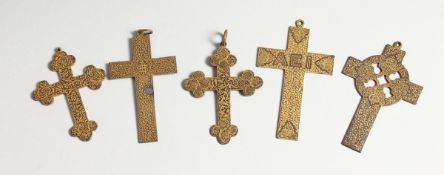 FIVE VARIOUS GILDED CROSSES, 2.25 to 3.5 inches long.