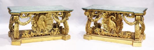 A SUPERB PAIR OF EARLY GEORGIAN, WILLIALM KENT DESIGN, MARBLE TOP AND GILDED CONSOLE TABLES. The