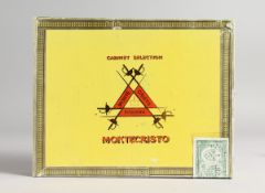 A BOX OF 25 MONTECRISTO HABANA CIGARS (not opened).