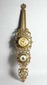 A FOUR DIAL CLOCK BAROMETER in a gilded frame, 31.5 ins long