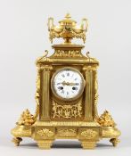 A VERY GOOD LOUIS XVI GILT ORMOLU MANTLE CLOCK, with white enamel dial, blue and white Roman