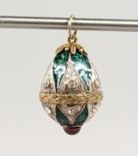 A RUSSIAN SILVER AND ENAMEL EGG PENDANT