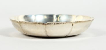 A PLAIN SILVER CIRCULAR DISH, 4.5 inches diameter, London 1967.