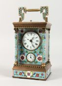 A CLOISONNE ENAMEL CARRIAGE CLOCK 6 ins high.