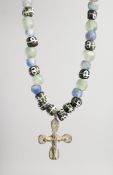 A ROMAN BEAD AND CROSS NECKLACE