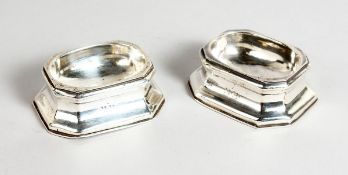 A PAIR OF GEORGE I SILVER TRENCHER SALTS 3 ins high, London 1717, maker Alexander Rood
