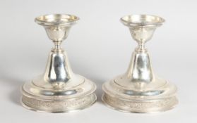 A PAIR OF AUSTRIAN SILVER CIRCULAR STANDS 6 ins high
