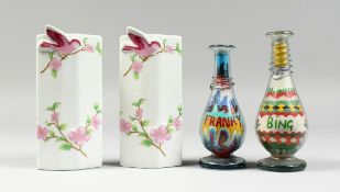 A PAIR OF OVAL VASES painted with birds, 5.5 in. high and two glass sand vases, 5 in. high. (4)