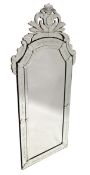 A LARGE VENETIAN MIRROR, bevelled glass in a scrolling mirror frame, 7 ft. 7 in. high, 3 ft. 6 in.