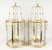A GOOD PAIR OF BRONZE ROPE LANTERNS with four candle sconces 30 ins high, 15 ins diameter.