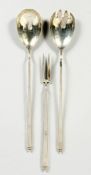 A PAIR OF ARTS AND CRAFTS SALAD SERVERS AND PICKLE FORKS Sheffield, 1930