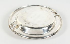 A BRITANNIA STANDARD SILVER CIRCULAR DISH AND COVER with pair of handles. 9.5 inches diameter,
