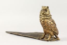 A COLD CAST OWL ON A FEATHER INKWELL 12 ins long