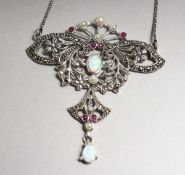 A SILVER AND OPAL PENDANT ON A CHAIN