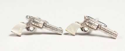 A PAIR OF SILVER AND MOTHER OF PEARL PISTOL CUFF LINKS