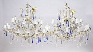 A GOOD LARGE PAIR OF TWO TIER ITALIAN CHANDELIERS with twenty one scrolling branches with prism