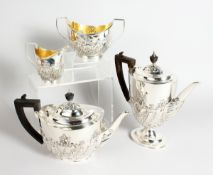 A GOOD VICTORIAN FOUR PIECE SILVER TEA SET, teapot, hot water jug, sugar basin and milk jug. London,