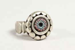A SILVER MILLEFIORI GLASS RING.