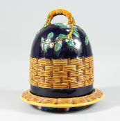 A MAJOLICA MINTON DESIGN POTTERY CHINESE DISH and cover.