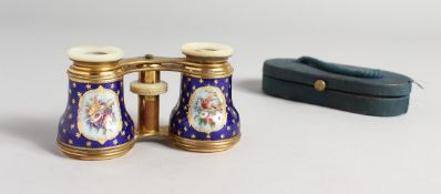 A FRENCH ENAMEL OPERA GLASS by L. Fischer, Paris, in a leather case.