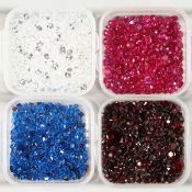 FOUR SMALL BOXES OF SPINEL STONES