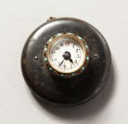 A SMALL SILVER BUTTONHOLE WATCH