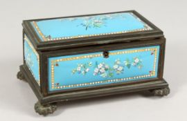 A 19TH CENTURY FRENCH BLUE ENAMEL JEWELLERY BOX, blue ground painted with flowers. 6.5ins long.