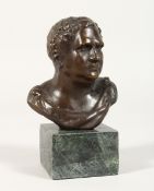AFTER THE ANTIQUE, A bronze bust on a marble plinth. 5 ins high