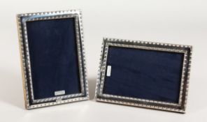 A PAIR OF BEAD EDGE PHOTOGRAPH FRAMES 7 ins x 4.5 ins