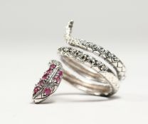 A SILVER RUBY SET SNAKE RING