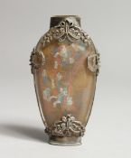A REVERSE-PAINTED SNUFF BOTTLE with filigree butterfly and dragon mounts. 7cm high.